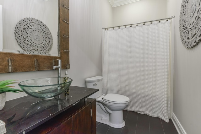 bathroom featuring toilet, tile patterned floors, vanity, and a shower with shower curtain