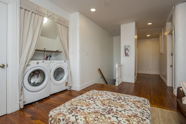 washroom with laundry area, recessed lighting, washer and dryer, baseboards, and hardwood / wood-style flooring