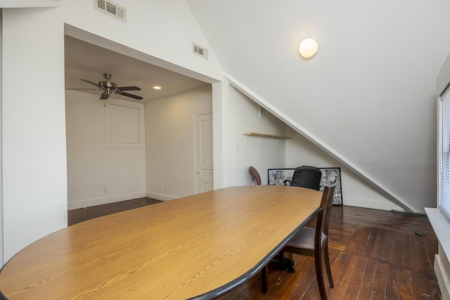 dining area featuring wood-type flooring, visible vents, vaulted ceiling, and ceiling fan