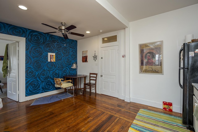 interior space featuring recessed lighting, baseboards, hardwood / wood-style floors, and a ceiling fan