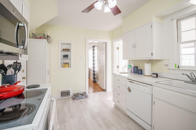 5 Bath Ave, Owingsville, KY 40360 - kitchen featuring visible vents, dishwasher, range with electric stovetop, a ceiling fan, and stainless steel microwave