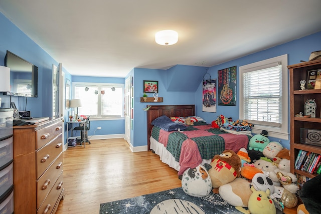 5 Bath Ave, Owingsville, KY 40360 - bedroom featuring light wood-style flooring and baseboards