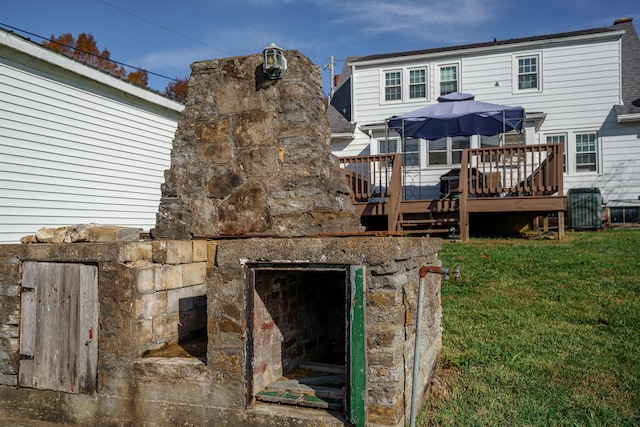 5 Bath Ave, Owingsville, KY 40360 - back of house with a yard, a deck, and central air condition unit