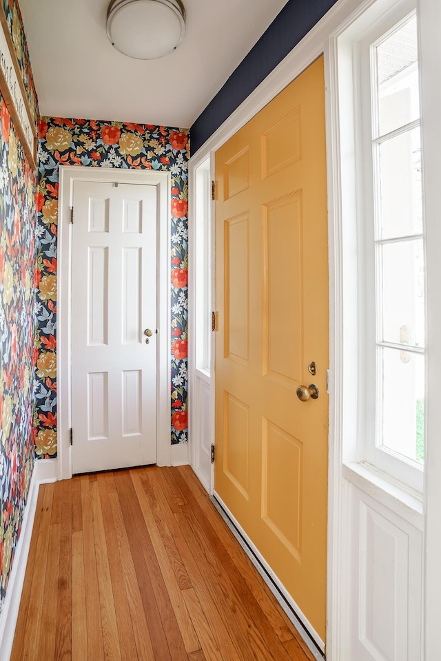 5 Bath Ave, Owingsville, KY 40360 - doorway featuring light wood finished floors and wallpapered walls