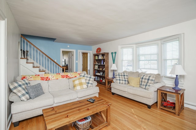 5 Bath Ave, Owingsville, KY 40360 - living room with stairs and wood finished floors