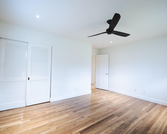 748 Wellington Way, Lexington, KY 40503 - unfurnished bedroom featuring light wood-type flooring, a closet, baseboards, and recessed lighting
