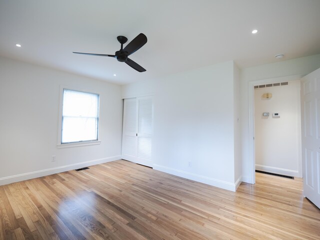 748 Wellington Way, Lexington, KY 40503 - unfurnished bedroom with light wood-style floors and visible vents