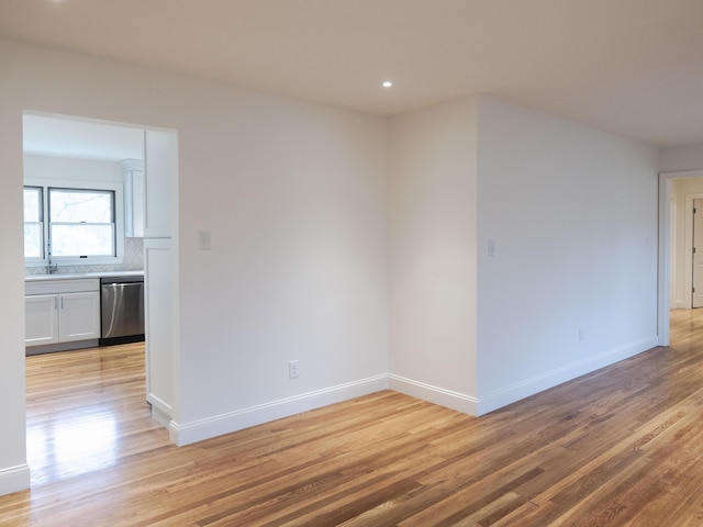 748 Wellington Way, Lexington, KY 40503 - spare room featuring light wood finished floors, baseboards, and recessed lighting