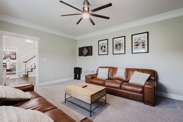 211 Eric Dr, Richmond, KY 40475 - carpeted living area with stairway, baseboards, crown molding, and ceiling fan with notable chandelier