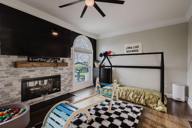 211 Eric Dr, Richmond, KY 40475 - bedroom featuring baseboards, wood finished floors, a fireplace, and ornamental molding