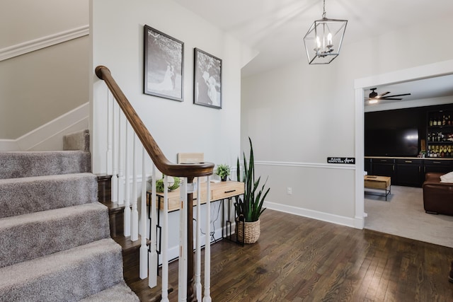 211 Eric Dr, Richmond, KY 40475 - stairway featuring ceiling fan with notable chandelier and hardwood / wood-style flooring