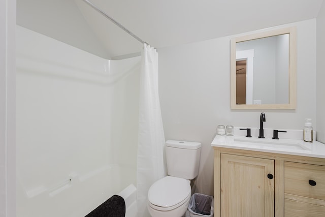 211 Eric Dr, Richmond, KY 40475 - full bathroom with lofted ceiling, toilet, and vanity