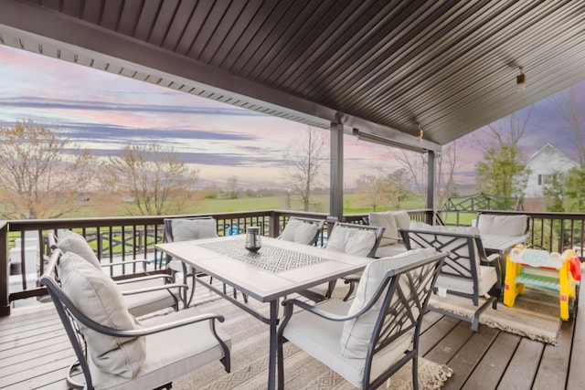 211 Eric Dr, Richmond, KY 40475 - deck at dusk featuring outdoor dining space