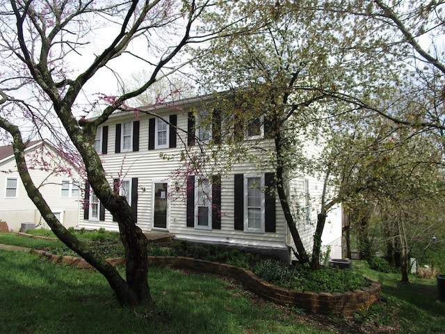 view of front facade featuring central air condition unit