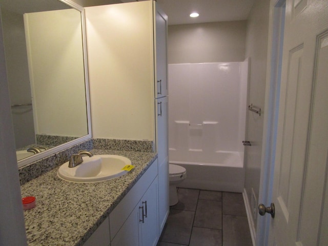 bathroom featuring toilet,  shower combination, tile patterned floors, vanity, and recessed lighting