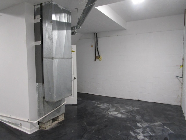 basement with concrete block wall