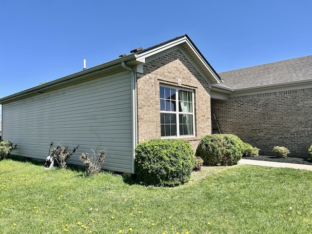 199 Newport Ln, Berea, KY 40403 - view of property exterior with brick siding and a lawn