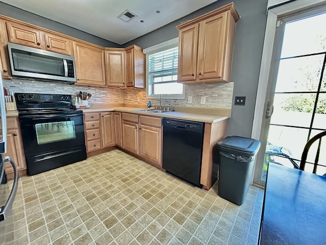 199 Newport Ln, Berea, KY 40403 - kitchen featuring black appliances, light countertops, tasteful backsplash, and a sink