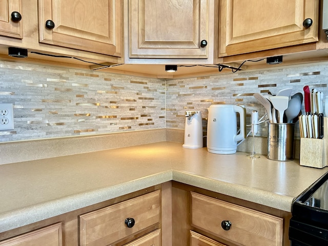 199 Newport Ln, Berea, KY 40403 - kitchen view of light countertops, tasteful backsplash, and light brown cabinets