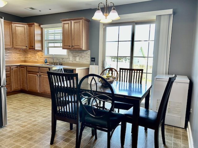 199 Newport Ln, Berea, KY 40403 - dining area with a chandelier and light flooring