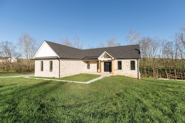 437 Boones Creek Rd, Lancaster, KY 40444 - view of front of home featuring a front yard, a shingled roof, metal roof, brick siding, and a standing seam roof