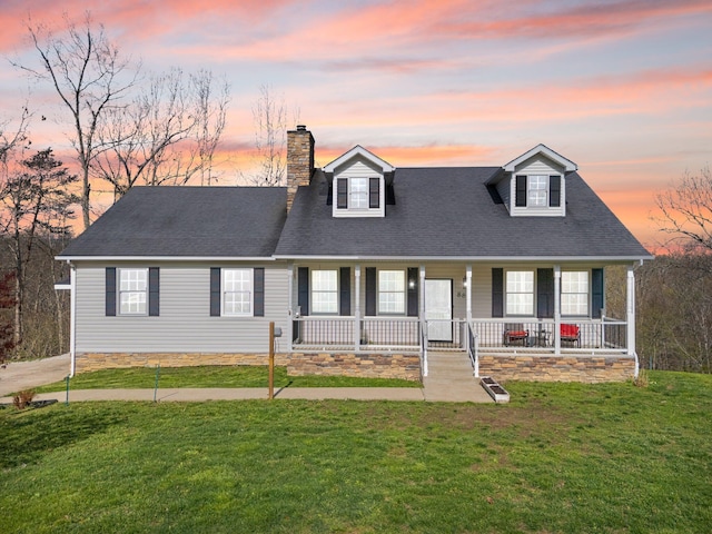 88 Hawkins Ln, Clay City, KY 40312 - cape cod home with roof with shingles, a yard, a porch, and a chimney
