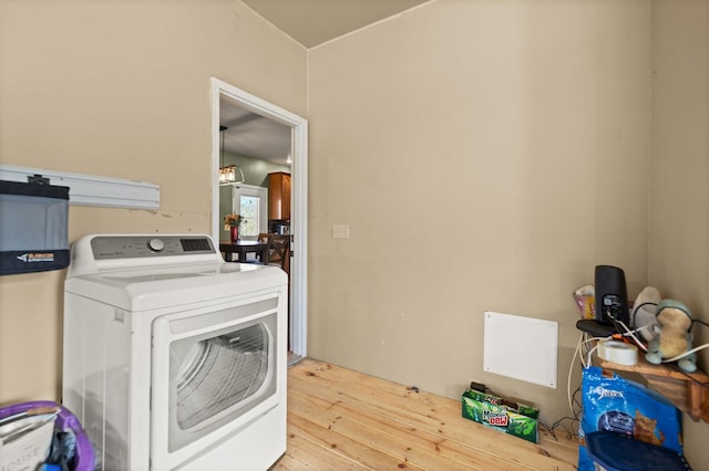 88 Hawkins Ln, Clay City, KY 40312 - laundry area featuring washer / clothes dryer, laundry area, and hardwood / wood-style floors