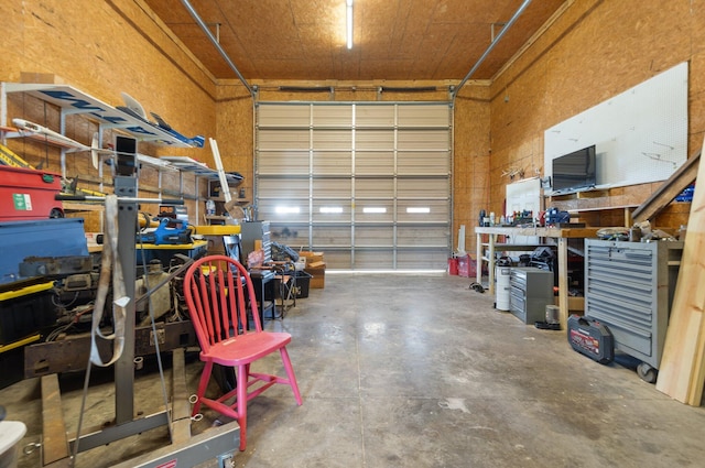 88 Hawkins Ln, Clay City, KY 40312 - garage featuring a workshop area