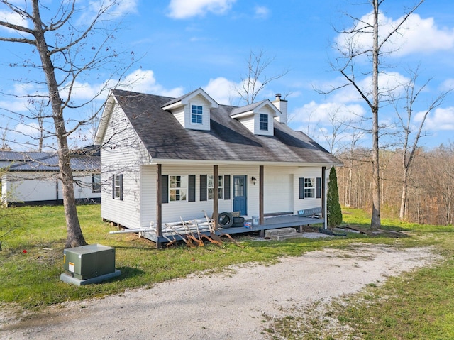 88 Hawkins Ln, Clay City, KY 40312 - cape cod house with a front yard, roof with shingles, and a chimney