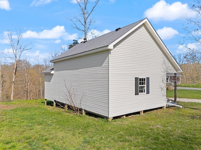 88 Hawkins Ln, Clay City, KY 40312 - view of home's exterior with a shingled roof and a lawn