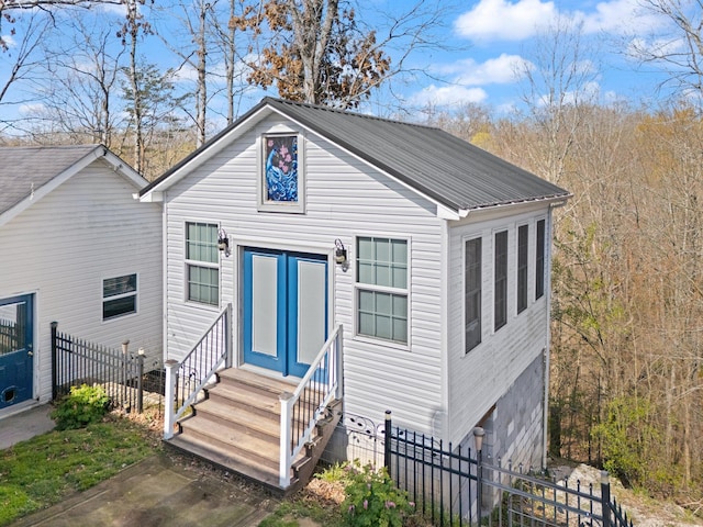 88 Hawkins Ln, Clay City, KY 40312 - bungalow with metal roof, entry steps, and fence