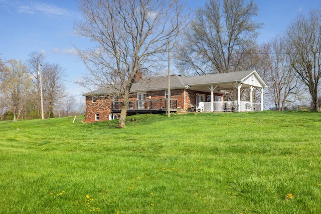 5245 US-68 W, Gravel Switch, KY 40328 - view of front facade with a front lawn, brick siding, a chimney, and a porch
