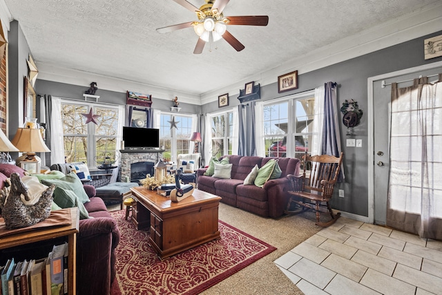 5245 US-68 W, Gravel Switch, KY 40328 - living room with a ceiling fan, a textured ceiling, healthy amount of natural light, a stone fireplace, and crown molding