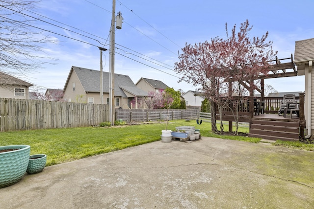 view of patio / terrace featuring a wooden deck and a pergola