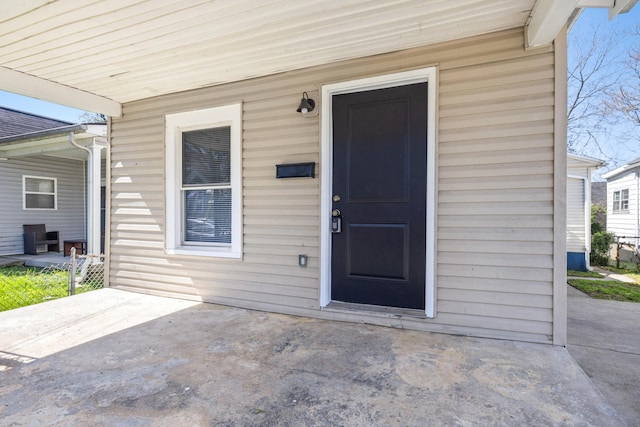 entrance to property with covered porch