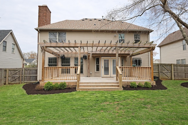 back of house featuring a chimney, a pergola, and a fenced backyard