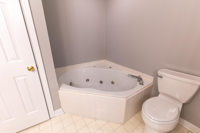full bathroom featuring toilet and a jetted tub