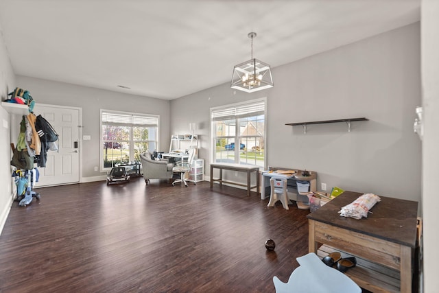 100 Barry Rd, Georgetown, KY 40324 - miscellaneous room with baseboards, wood finished floors, and a notable chandelier