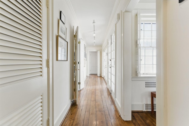 216 Ridgeway Rd, Lexington, KY 40502 - hall with crown molding, visible vents, baseboards, and hardwood / wood-style flooring