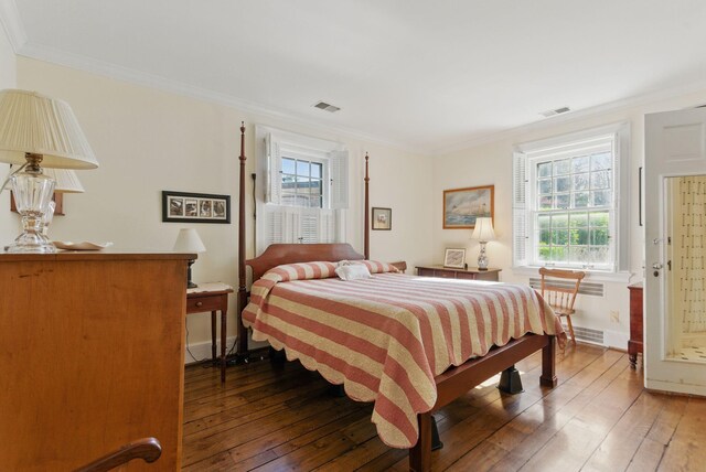 216 Ridgeway Rd, Lexington, KY 40502 - bedroom featuring ornamental molding, visible vents, and hardwood / wood-style flooring