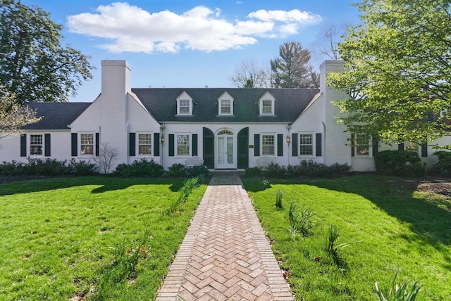 216 Ridgeway Rd, Lexington, KY 40502 - view of front of home with a front yard and a chimney