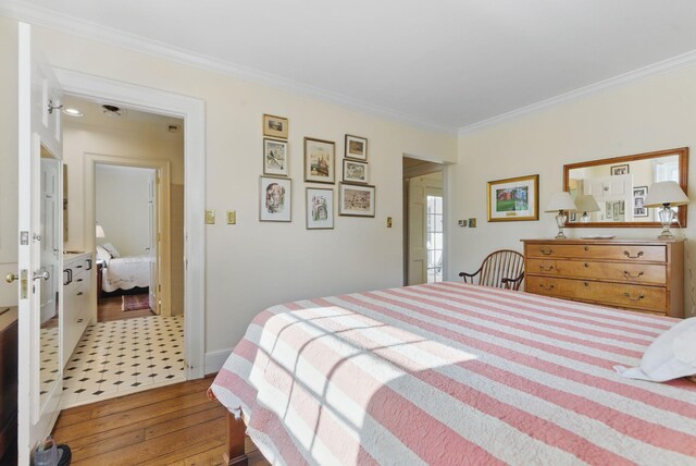 216 Ridgeway Rd, Lexington, KY 40502 - bedroom with ornamental molding and wood-type flooring