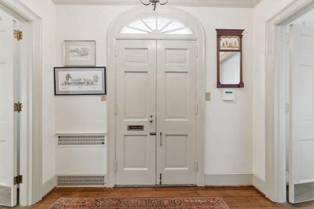 216 Ridgeway Rd, Lexington, KY 40502 - foyer featuring baseboards, crown molding, and wood finished floors