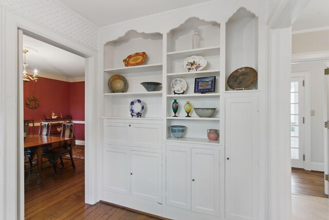 216 Ridgeway Rd, Lexington, KY 40502 - details with a notable chandelier, baseboards, ornamental molding, and wood finished floors