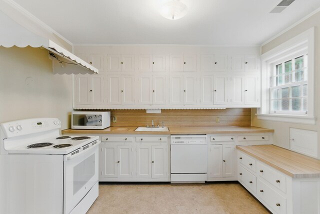 216 Ridgeway Rd, Lexington, KY 40502 - kitchen with white cabinets, a sink, light countertops, white appliances, and backsplash