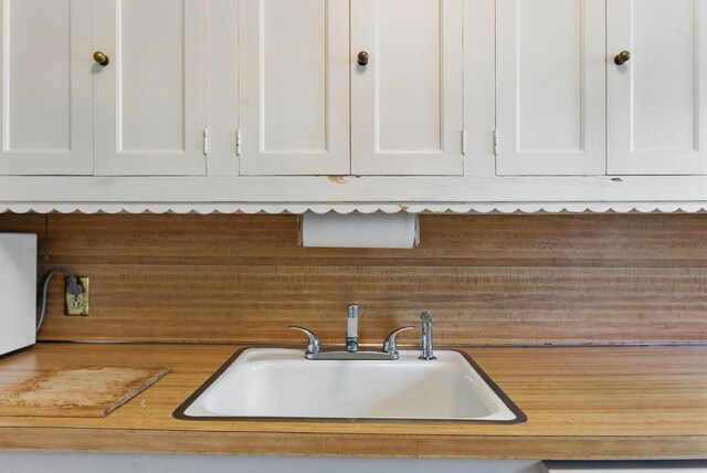 216 Ridgeway Rd, Lexington, KY 40502 - interior space featuring white cabinets, light countertops, and a sink