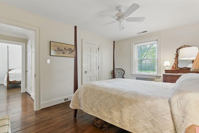 216 Ridgeway Rd, Lexington, KY 40502 - bedroom featuring visible vents, dark wood-style flooring, baseboards, and a ceiling fan