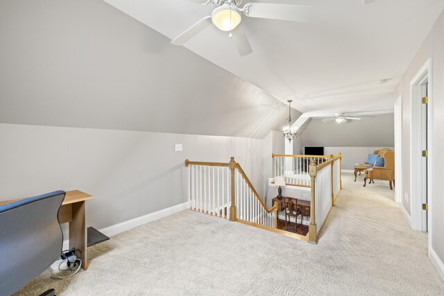 bonus room with baseboards, carpet, ceiling fan, and vaulted ceiling