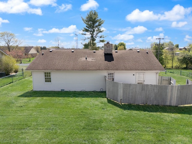 1124 Heartland Dr, Somerset, KY 42503 - rear view of property with a yard, a shingled roof, fence, and a chimney