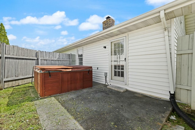 1124 Heartland Dr, Somerset, KY 42503 - view of patio with a fenced backyard and a hot tub